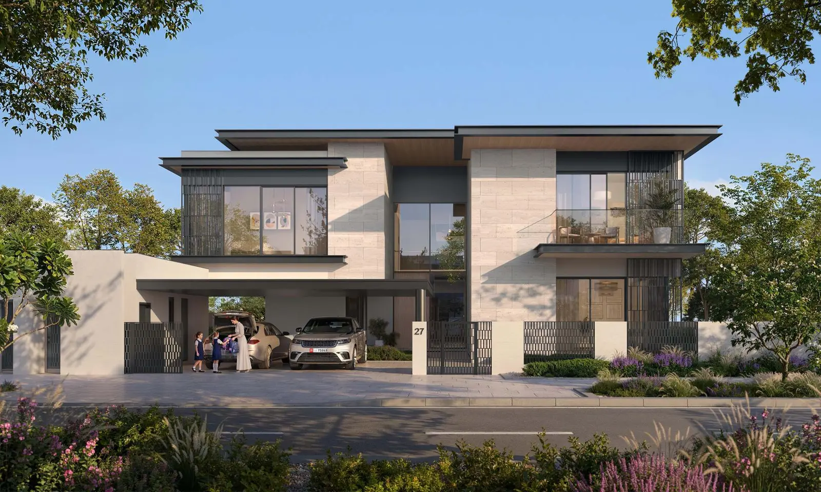 Front facade of a two-story Talay villa with crisp white walls, light stone accents, and large floor-to-ceiling windows.