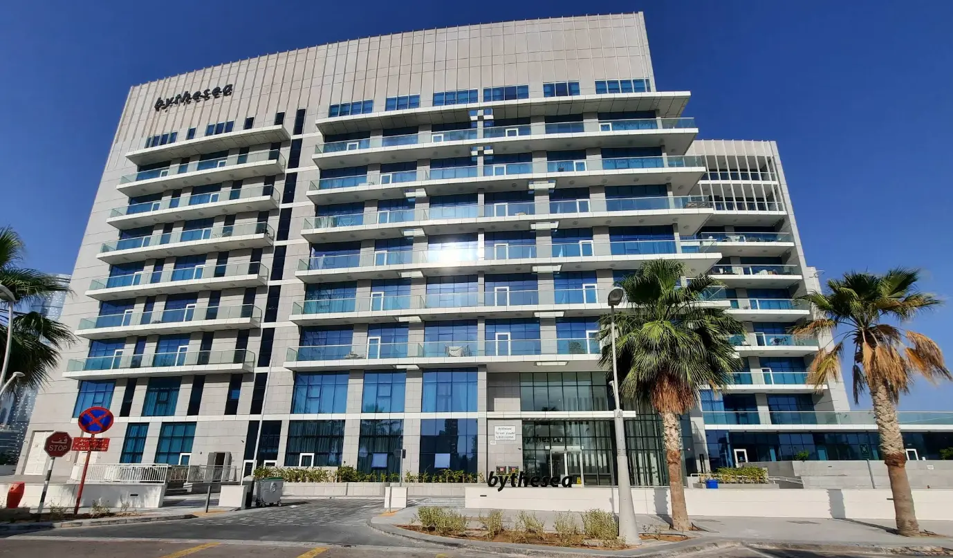 Upper-level expansive terrace and exterior facade framing panoramic coastal views at By The Sea Tower on Al Reem Island.
