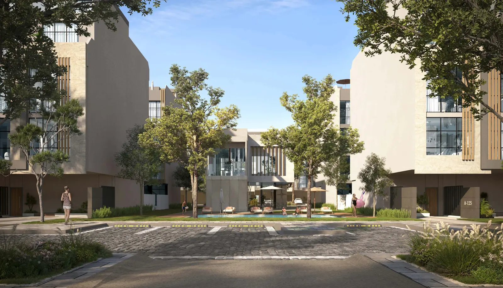 Private swimming pool and landscaped garden at a Reportage Village townhouse in Khalifa City Abu Dhabi offering luxury outdoor living .