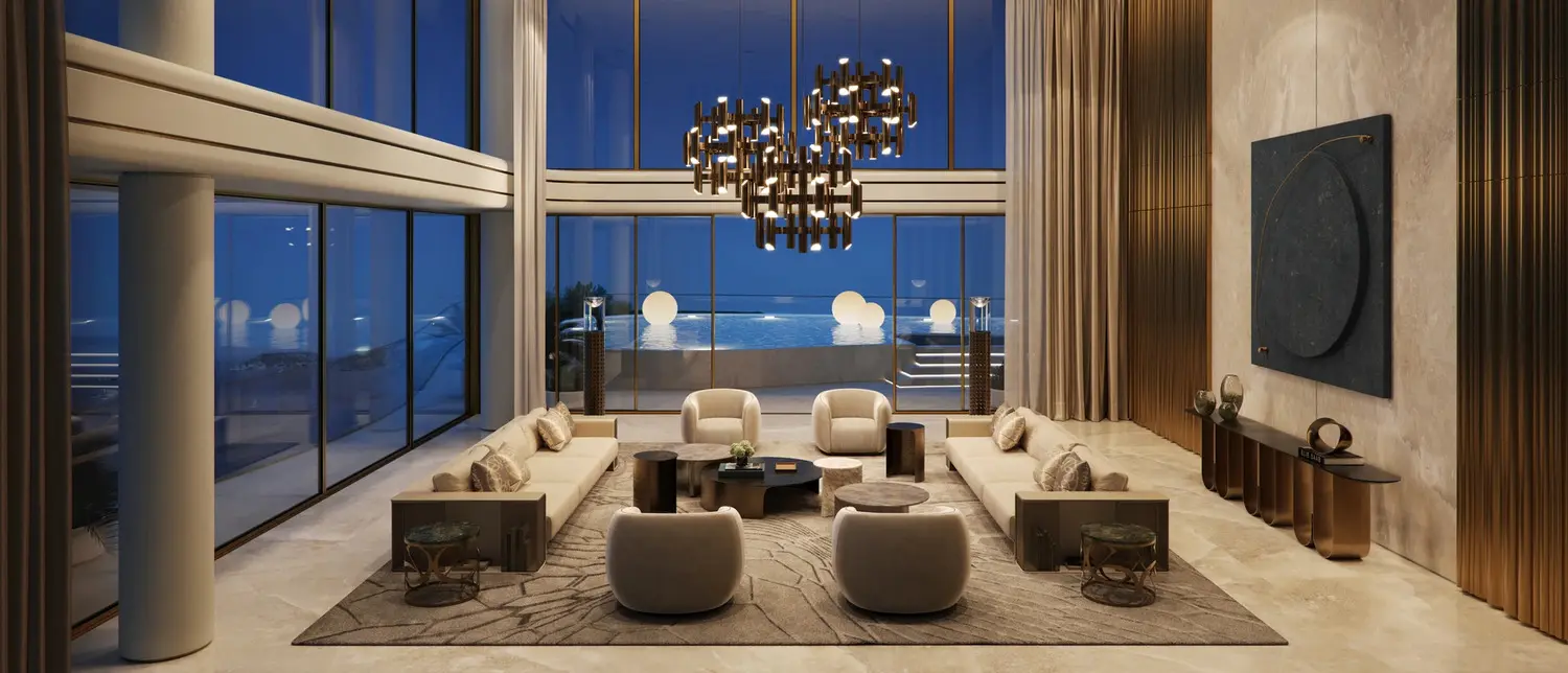 Sleek show kitchen inside Elie Saab Waterfront Al Reem Island Abu Dhabi featuring custom cabinetry and integrated appliances.